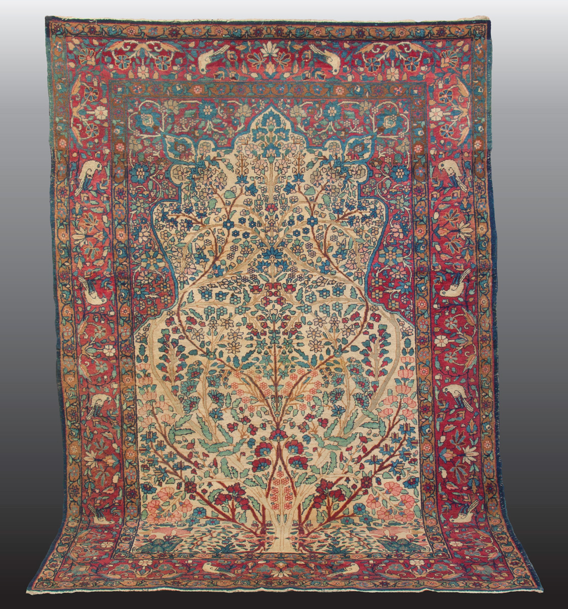 Appraisal: Kirman Oriental Rug C Tree of life pattern with bird