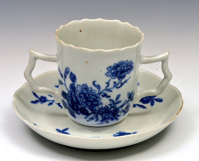 Appraisal: A CHINESE TREMBLEUS SOFT PASTE CUP and saucer decorated in