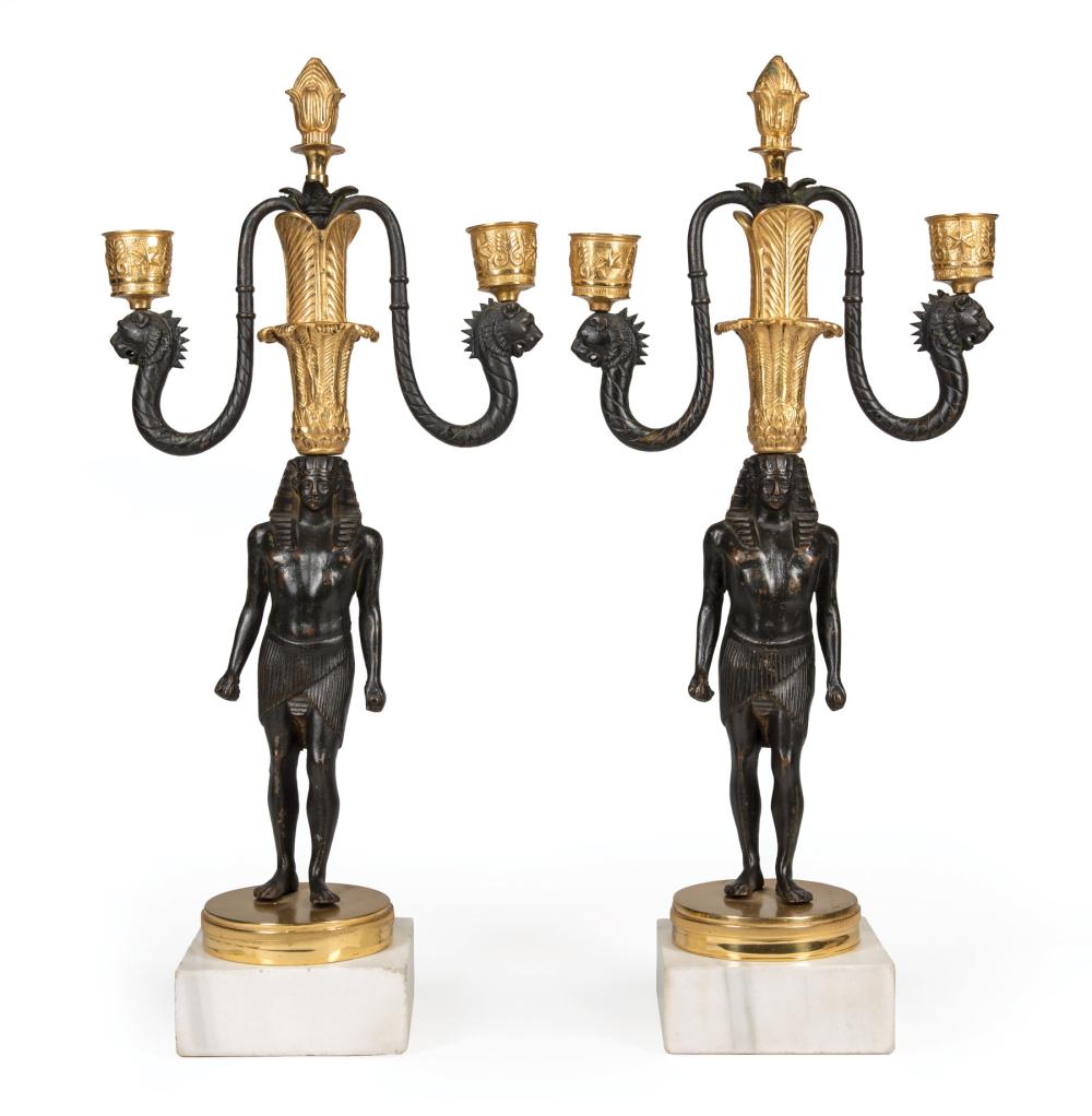 Appraisal: Pair of Egyptian Revival Gilt and Patinated Bronze Two-Light Candelabra