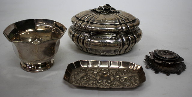 Appraisal: A CONTINENTAL GRADE SILVER OVAL BOX AND COVER with engraved