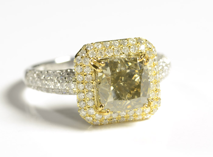 Appraisal: FANCY BROWNISH YELLOW DIAMOND RING with appraisal The k white