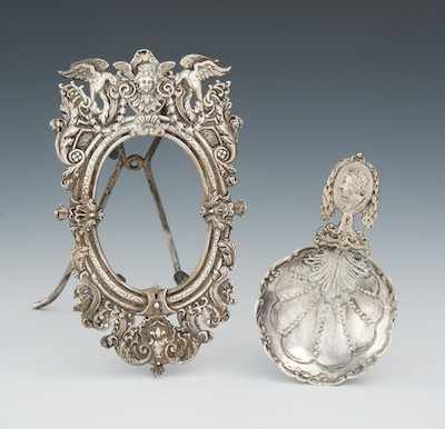 Appraisal: A Silver Repousse Picture Frame and a Wine Taster The