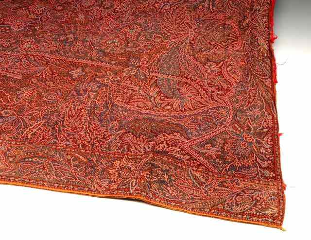 Appraisal: A KASHMIRI SHAWL with a blue green and pink foliate