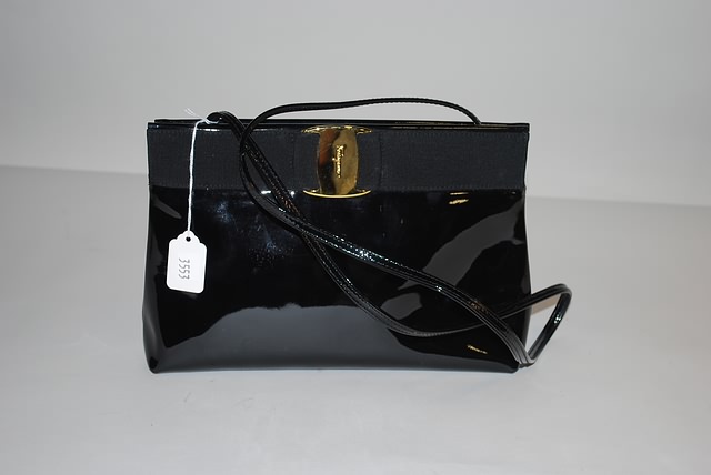 Appraisal: Salvatore Ferragamo black patent leather envelope handbag with signature accent