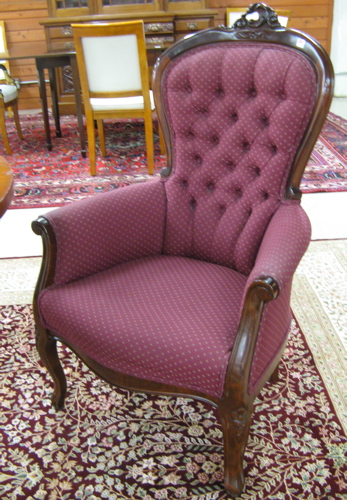 Appraisal: TWO VICTORIAN STYLE MAHOGANY ARMCHAIRS with similar carved and molded