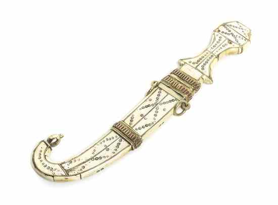 Appraisal: A Middle Eastern Bone Veneered and Silvered Metal Inlaid Dagger