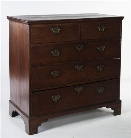 Appraisal: A George II oak chest the moulded rectangular top on