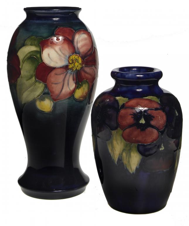 Appraisal: A MOORCROFT PANSY VASE DESIGNED BY WILLIAM MOORCROFT AND A