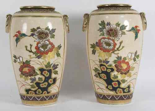 Appraisal: A pair of Satsuma vases enamelled figures in landscapes with