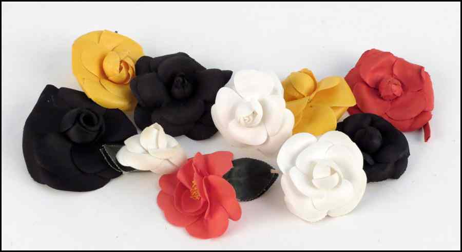 Appraisal: CHANEL RED FLOWER PIN Together with black white and yellow