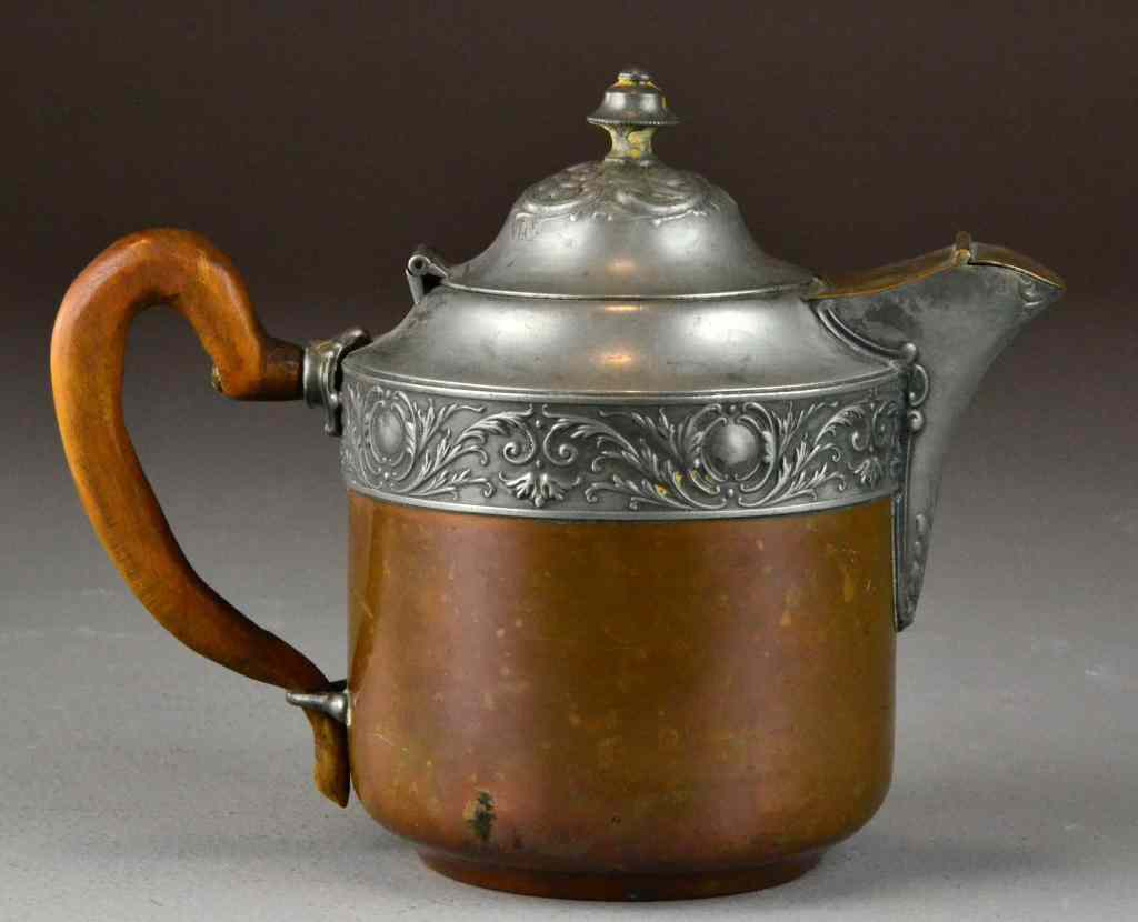 Appraisal: Manning Bowman Copper Pewter TeapotWith a hand carved wooden handle