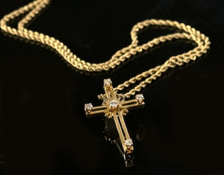 Appraisal: Fourteen-Karat Yellow Gold and Diamond Cross and Chain composed of