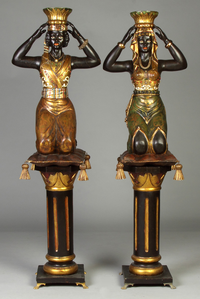 Appraisal: Two Carved Gilded Painted Blackamoors on Stand th cent