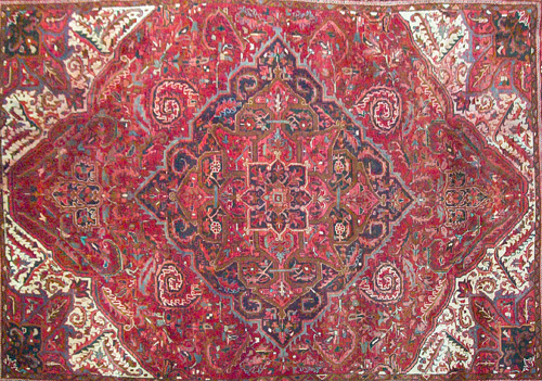 Appraisal: PERSIAN Rug with vinescroll and floral medallion in crimson cobalt