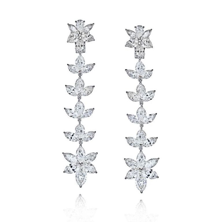 Appraisal: PLATINUM CT DIAMOND EARRINGS Shimmering diamond dangling flower motif earrings