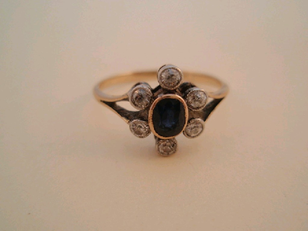 Appraisal: A Victorian gem set dress ring a central oval faceted