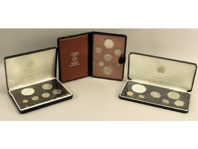 Appraisal: Collection of cased coin proof sets including a seven coin