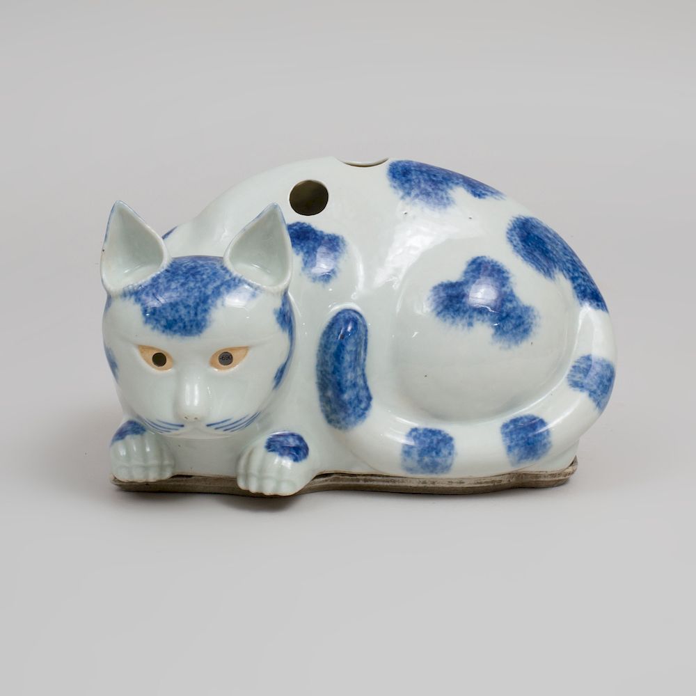 Appraisal: Chinese Blue and White Porcelain Cat Form Nightlight and Stand