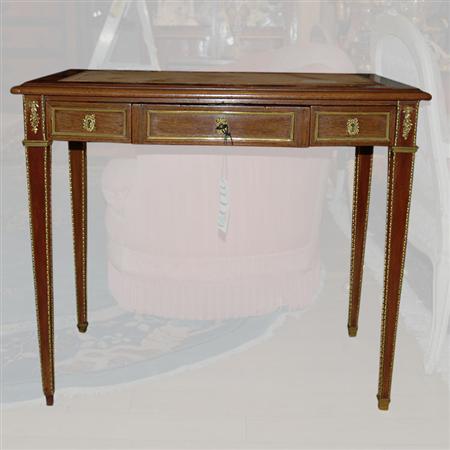 Appraisal: Louis XVI Style Gilt-Metal Mounted Walnut Diminutive Bureau Plat Estimate