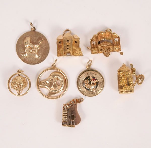 Appraisal: Lot of pieces gold charms Three discs marked K g