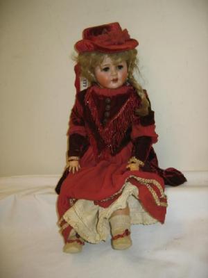 Appraisal: A Max Handwerk Bebe Elite bisque head doll with grey