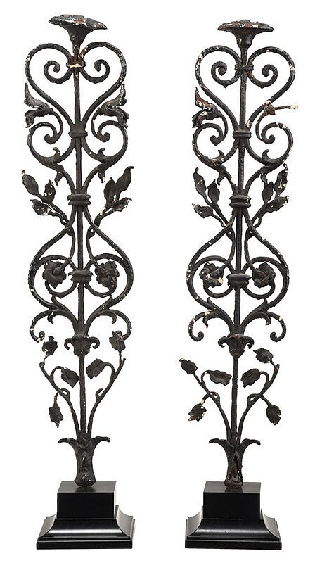 Appraisal: Pair th Century Wrought Iron Ornaments American painted scrolled architectural