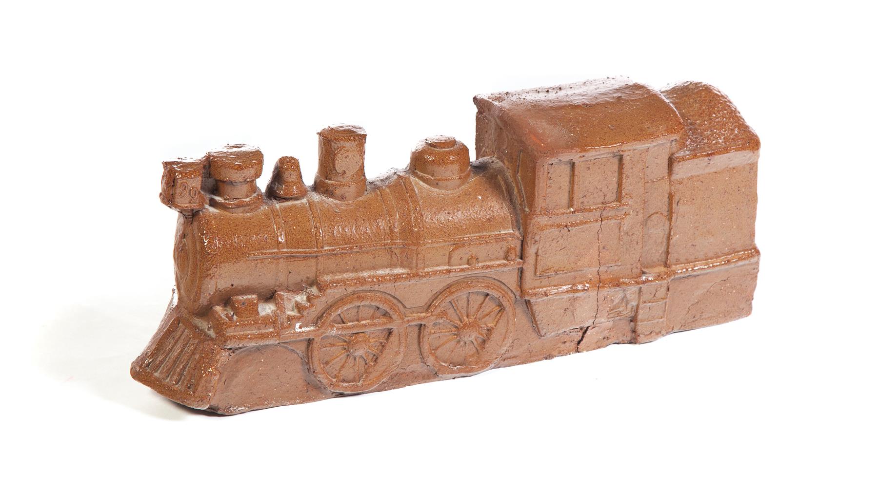 Appraisal: OHIO SEWERTILE TRAIN ENGINE First half- th century Scarce train