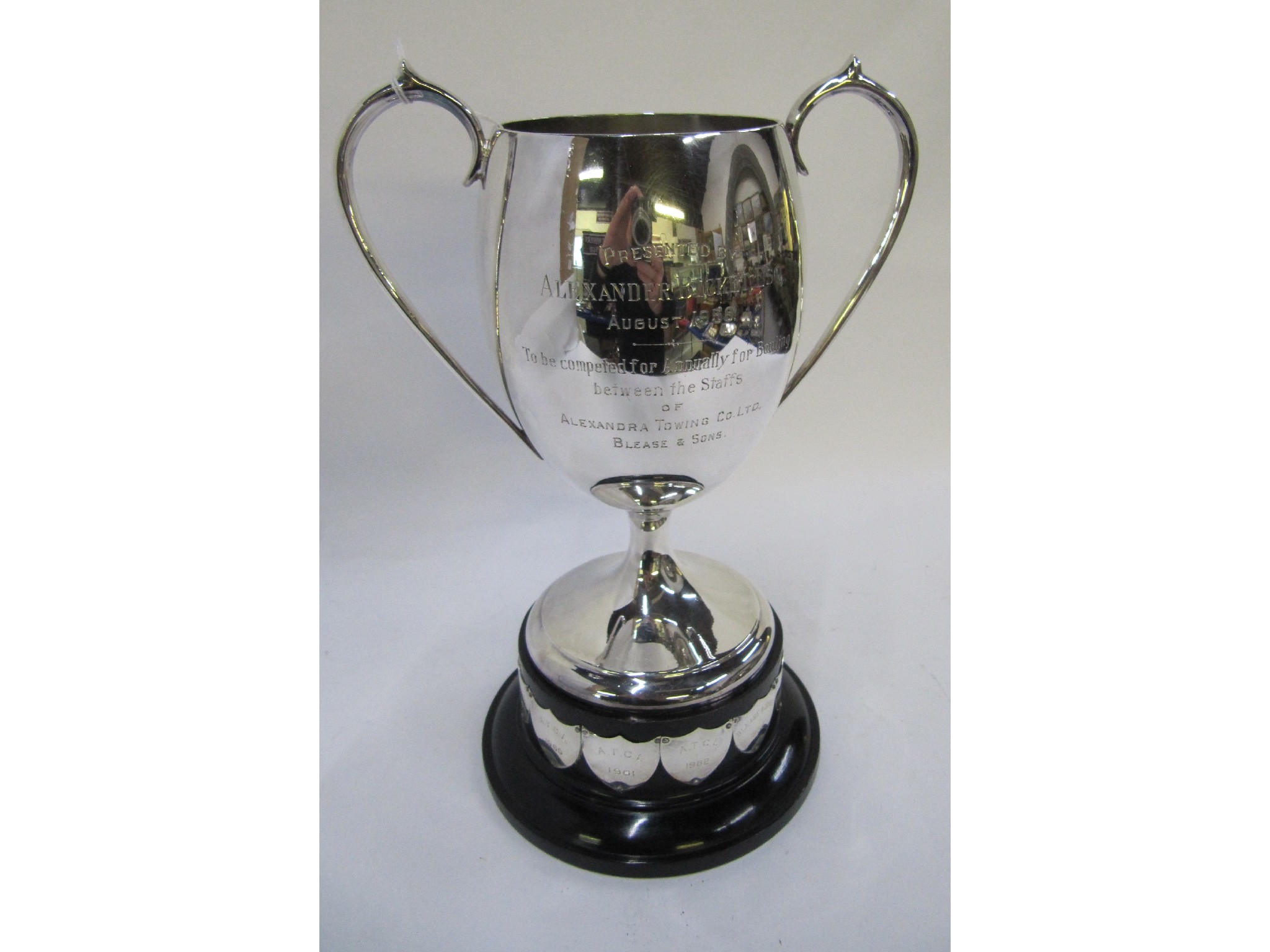 Appraisal: A silver plated trophy cup in mahogany case