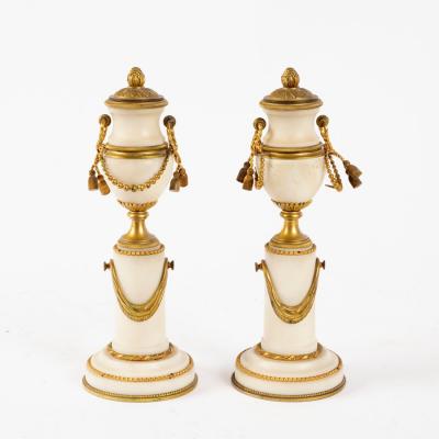 Appraisal: A pair of gilt metal mounted garniture vases each modelled