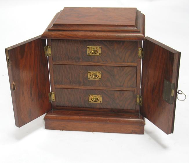 Appraisal: A VICTORIAN WALNUT VENEERED COLLECTORS CABINET with a rectangular top