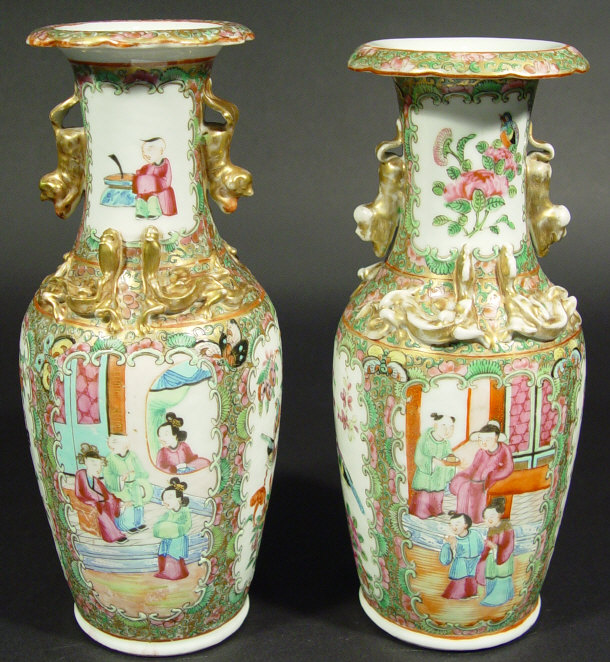 Appraisal: Pair of Cantonese porcelain vases relief moulded with dog of