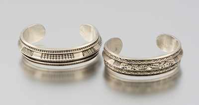 Appraisal: A Pair of Sterling Silver Cuff Bracelets by J Bond