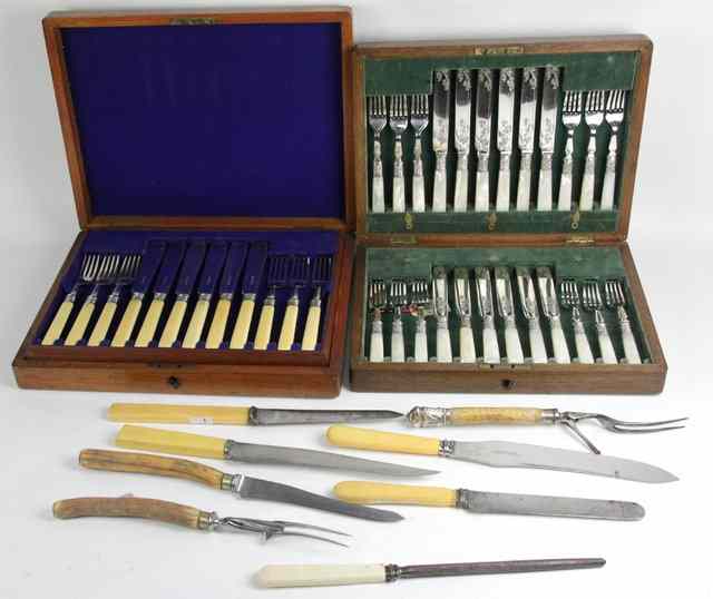 Appraisal: A set of twelve ivory handled fish knives and forks