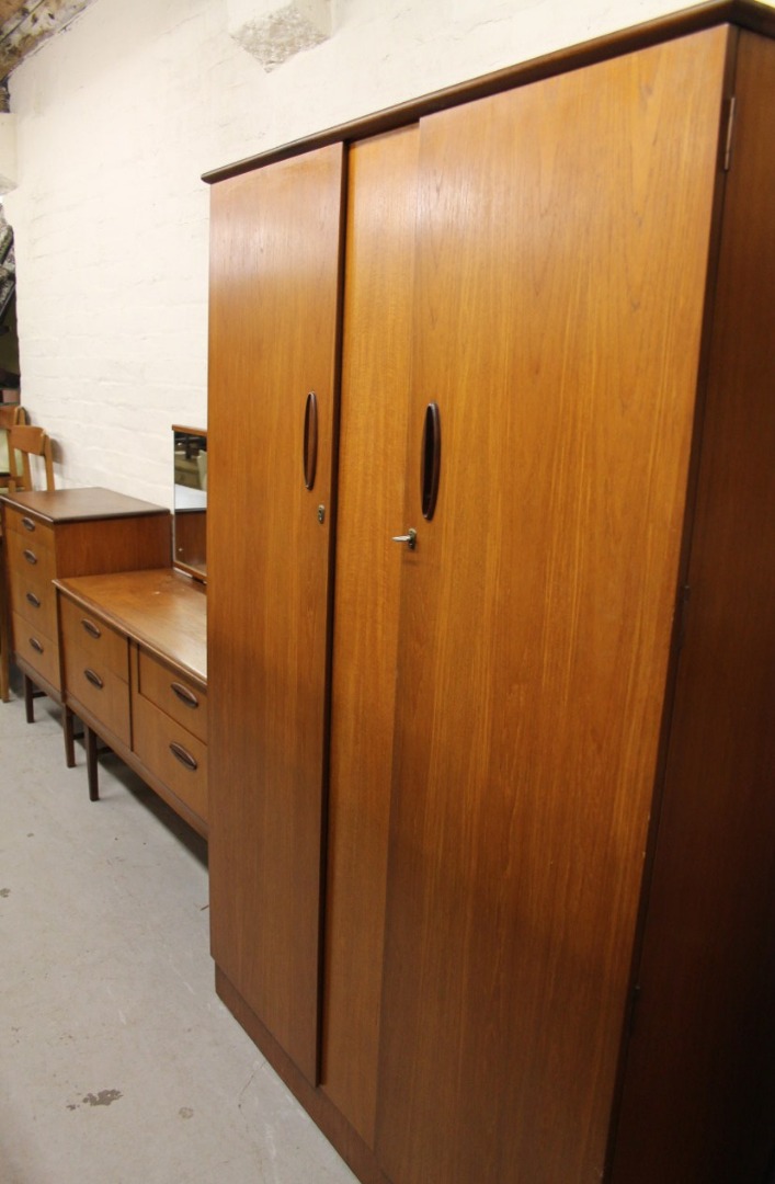 Appraisal: A 's teak part bedroom suite comprising Homeworthy double door