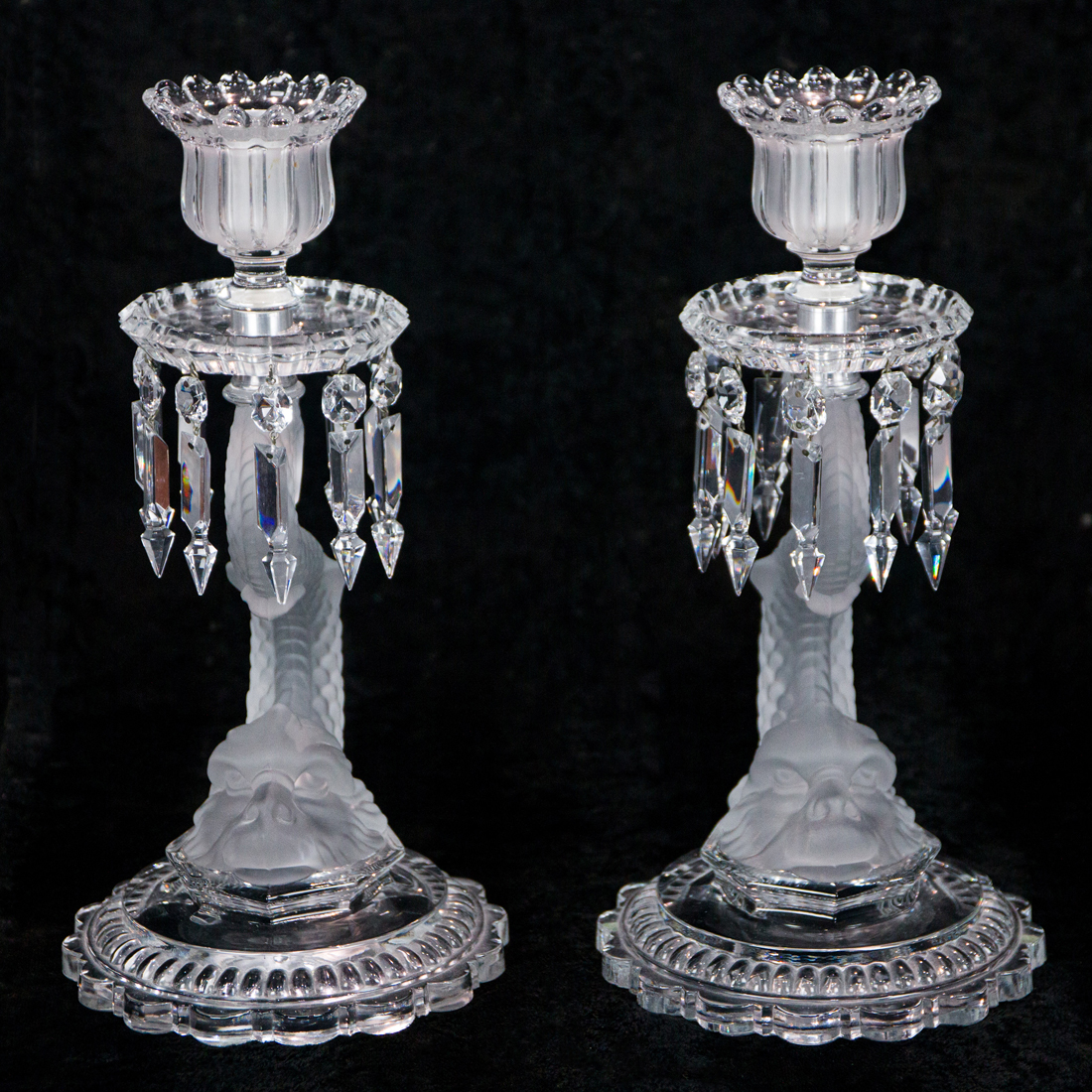 Appraisal: A PAIR OF BACCARAT FROSTED AND CLEAR GLASS LUSTER CANDLESTICKS