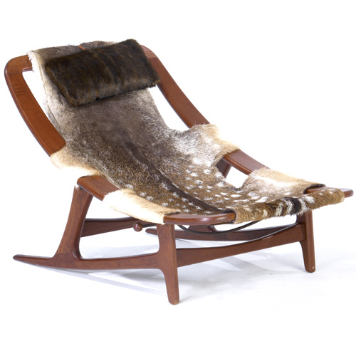 Appraisal: HOLMEN COLLEN FREDERICK KAYSER Teak reclining lounge chair with animal