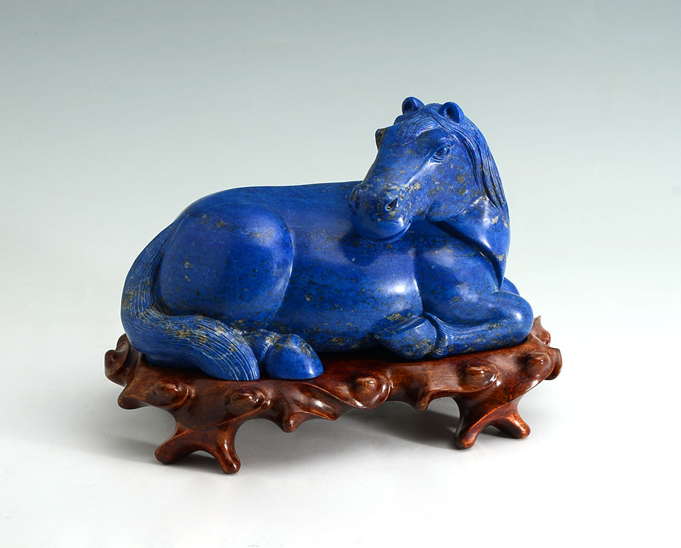 Appraisal: CHINESE CARVED LAPIS FIGURAL HORSE Carved lapis lazuli figure of