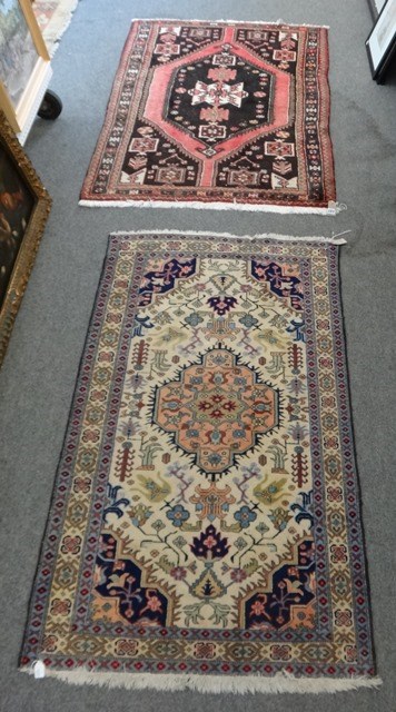 Appraisal: A N W Persian rug the madder field with a