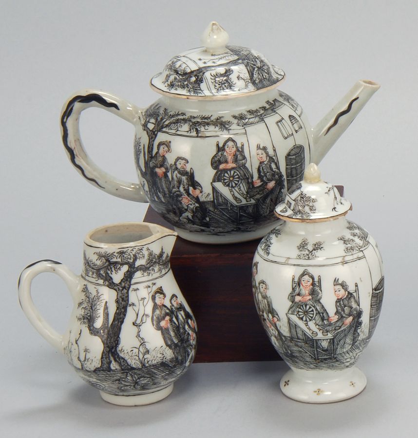 Appraisal: THREE-PIECE CHINESE EXPORT PORCELAIN TEA SET th CenturyWith grisaille decoration