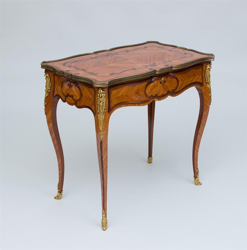 Appraisal: LOUIS XV STYLE GILT-BRONZE-MOUNTED TULIPWOOD AND AMARANTH MARQUETRY CENTER TABLE