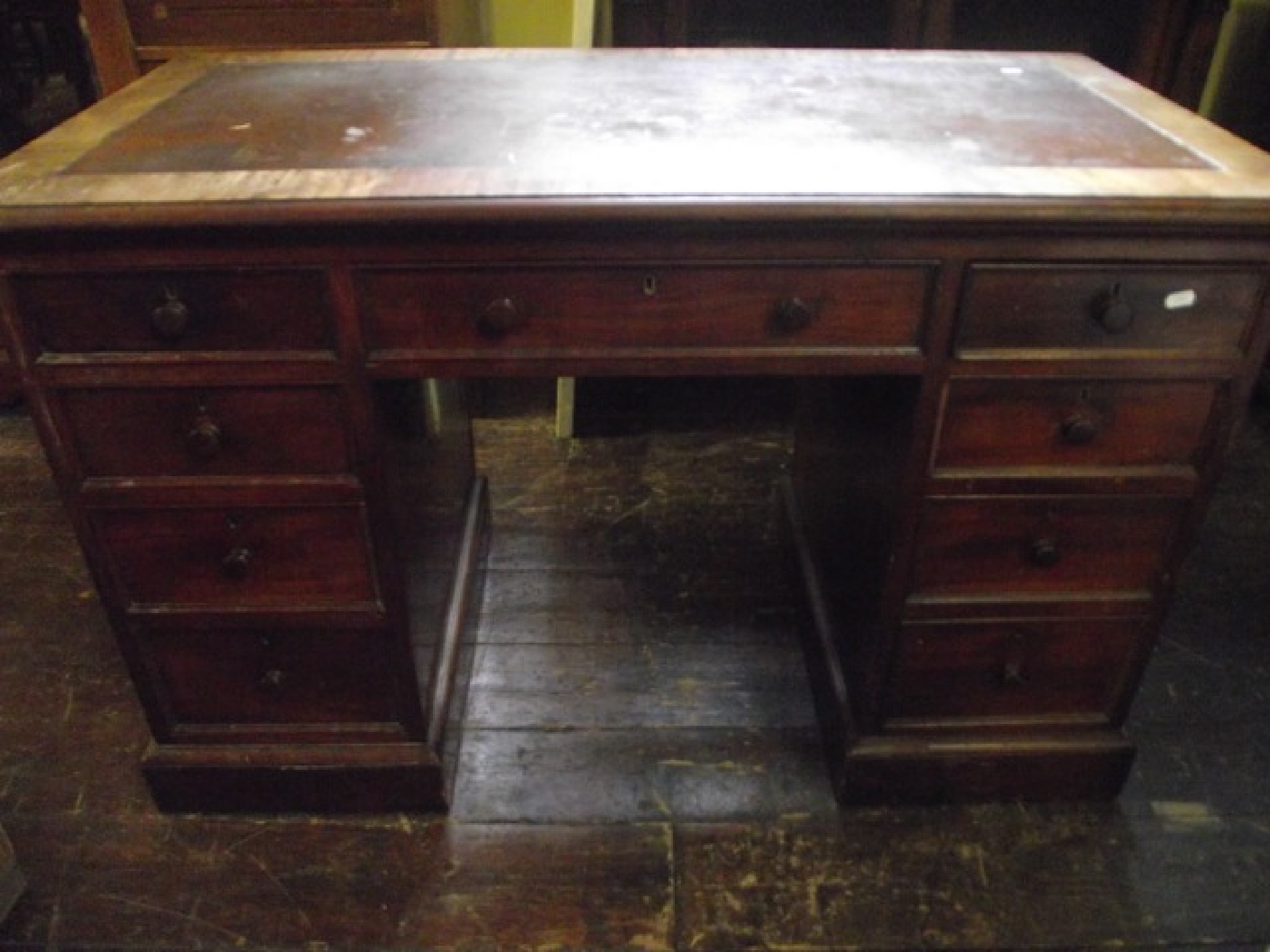 Appraisal: A mid th century mahogany writing desk one sided fitted