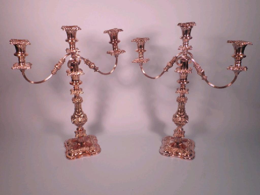 Appraisal: A pair of thC silver plated three branch candelabra each