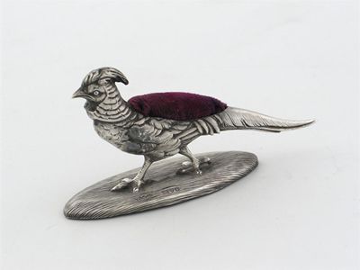 Appraisal: A Chinese pheasant pin cushion by Sampson Morden Co Chester