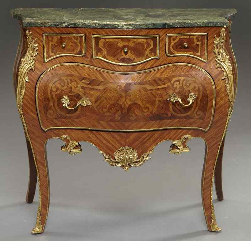 Appraisal: French inlaid bombe marble top commode withormolu mounts and three