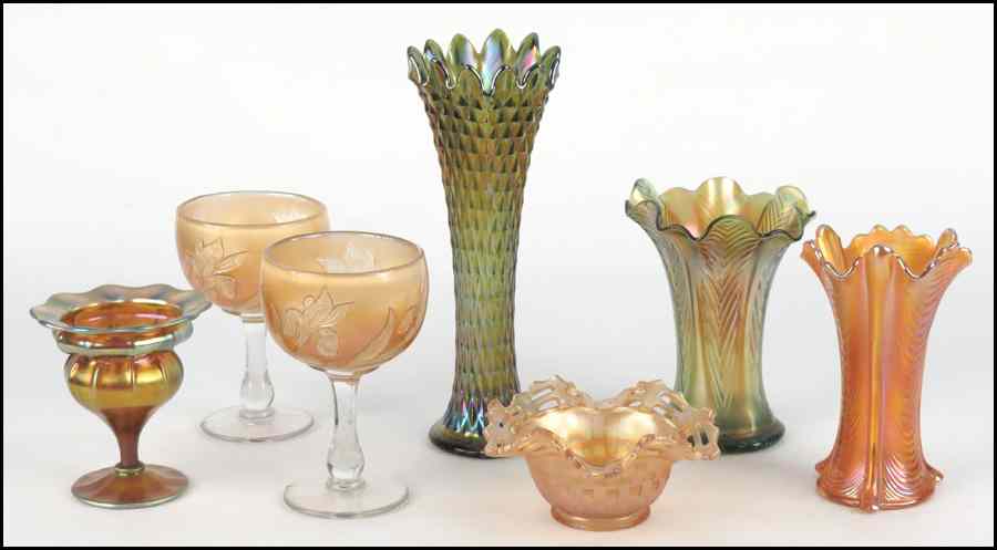 Appraisal: THREE CARNIVAL GLASS VASES Together with a pair of carnival