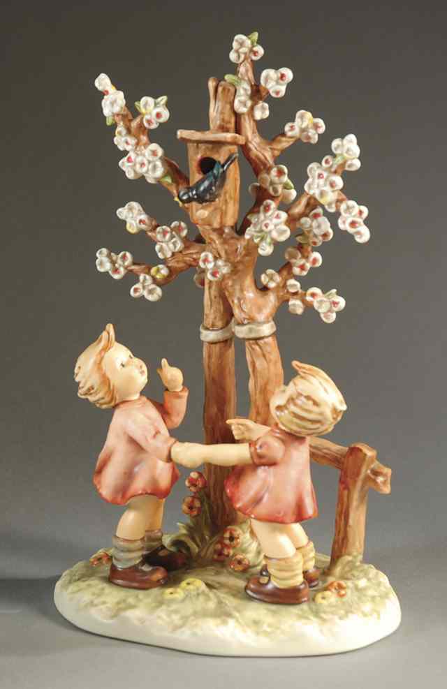 Appraisal: GERMAN HUMMEL PORCELAIN FIGURAL GROUP ''Welcome Spring '' HUM TM-