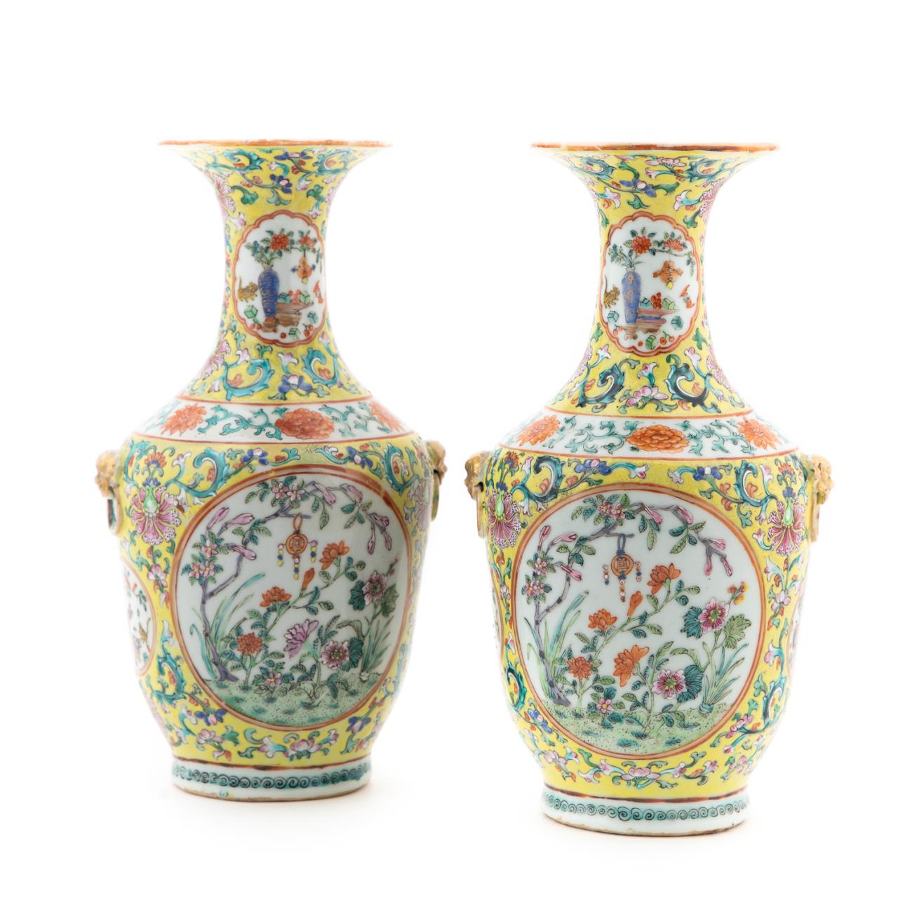 Appraisal: PAIR OF CHINESE YELLOW GROUND FAMILLE ROSE VASES Pair of