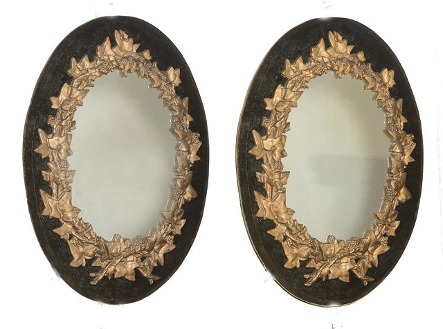 Appraisal: A PAIR OF VICTORIAN GILT METAL WALL MIRRORS mounted on