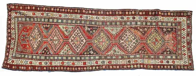 Appraisal: Antique Caucasian Runnerwool with cotton foundation linear medallion motif with