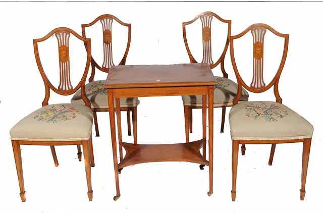 Appraisal: A SET OF FOUR SATINWOOD SHIELD BACK DINING CHAIRS with